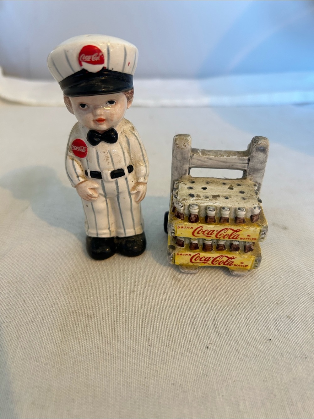 Coca Cola delivery man salt and pepper shakers with Yellow Bottle Crates